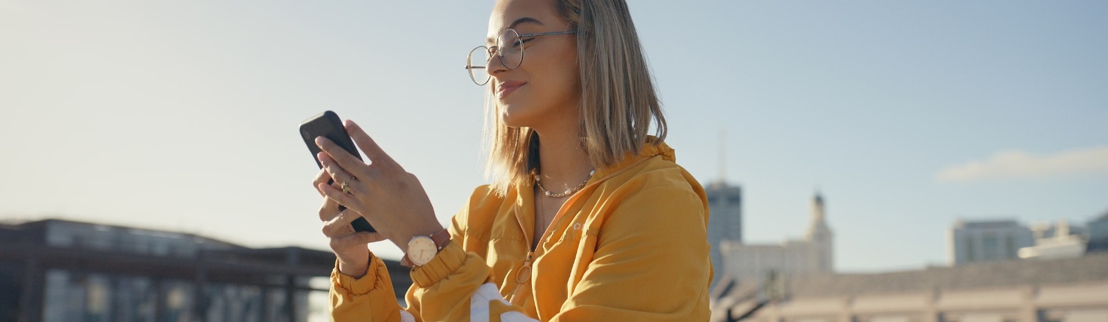 a woman playing with her mobile phone